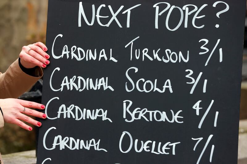 articles/2013/03/04/betting-on-next-pope-gives-favorable-odds-to-italian-ghanaian-clerics/130301-zeitline-betting-pope-tease-embed_gnfnpc