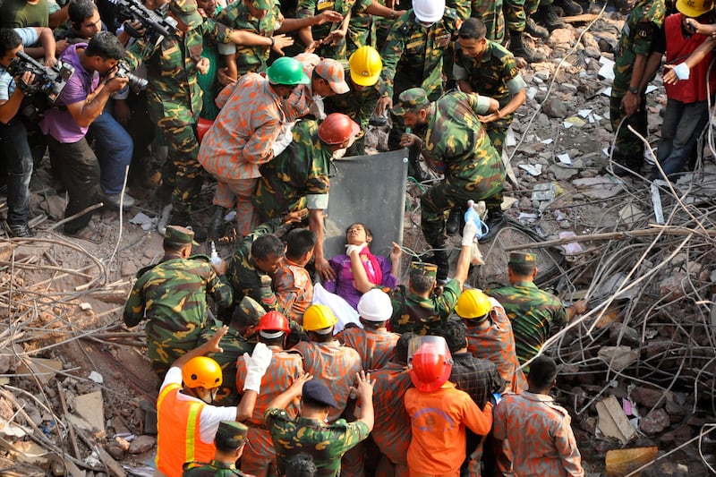 galleries/2013/05/10/woman-rescued-from-rubble-17-days-after-bangladesh-factory-collapse-photos/garment-rescue-2_fnnkzl
