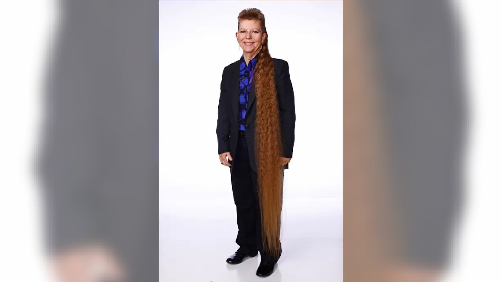 Tennessee woman Tami Manis shows off her record-breaking mullet.