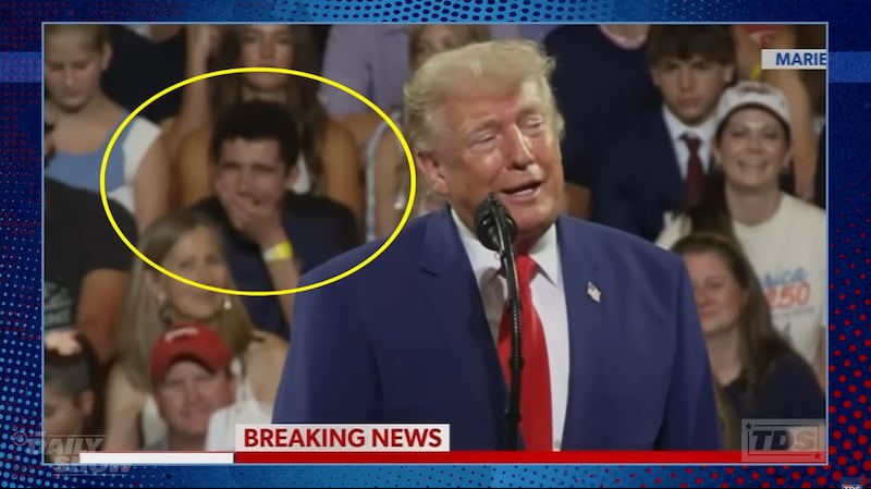 A man at a rally in Georgia yawns as Trump speaks for over an hour.