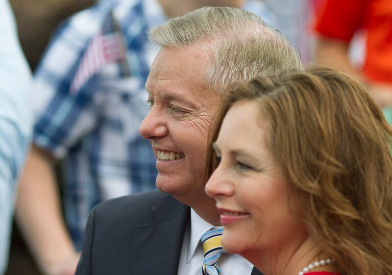 Senator Lindsey Graham stands with his sister Darline Graham after formally announcing his campaign for the 2016 Republican presidential nomination in his hometown Central, South Carolina June 1, 2015.