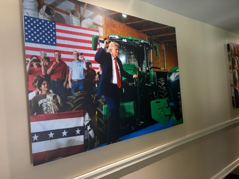 An image of Trump hanging on the wall inside the American Airlines Center in Dallas for the Repubilcan midterm convention.