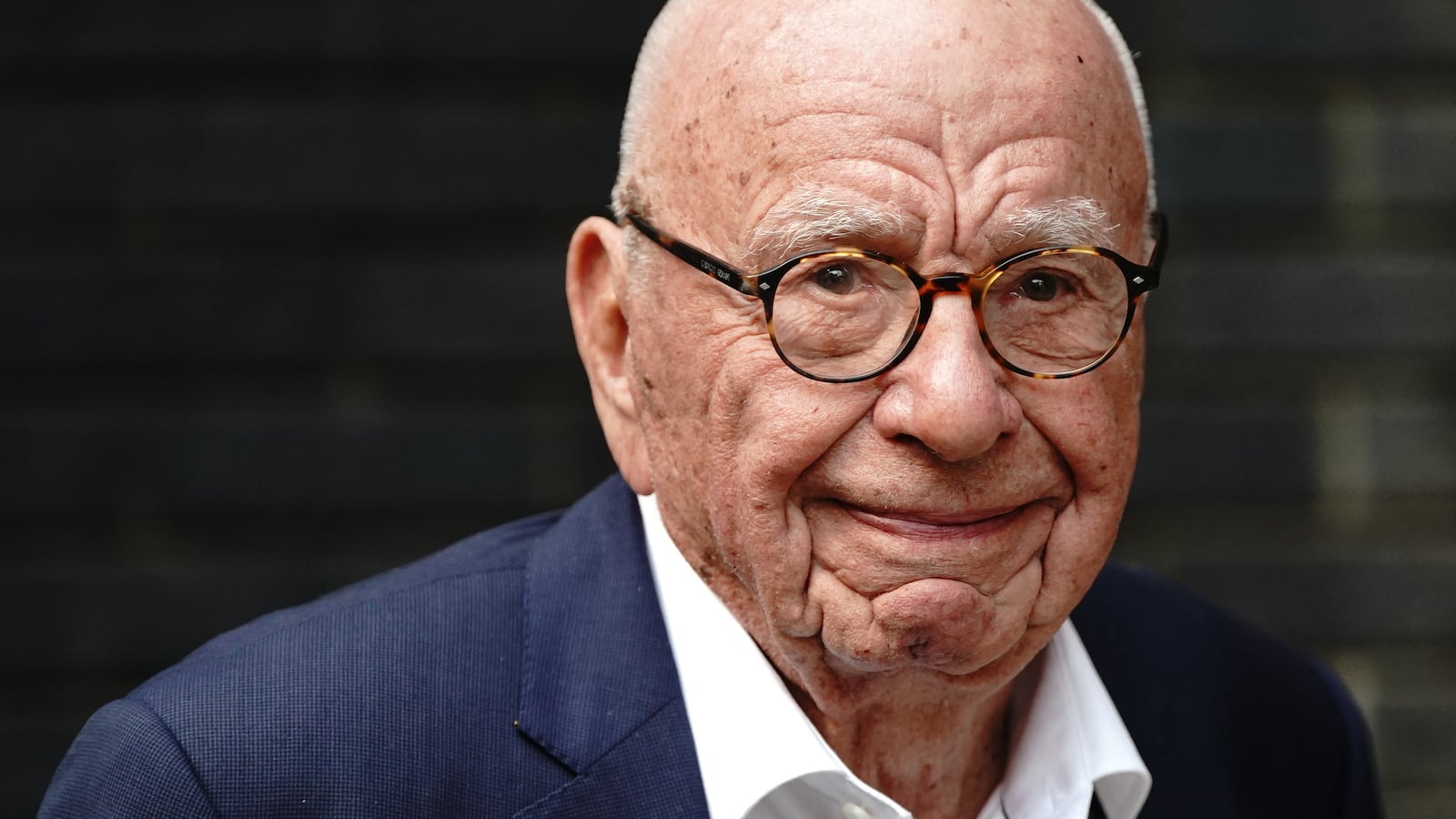 Rupert Murdoch appears at his annual party at Spencer House, St James' Place in London.