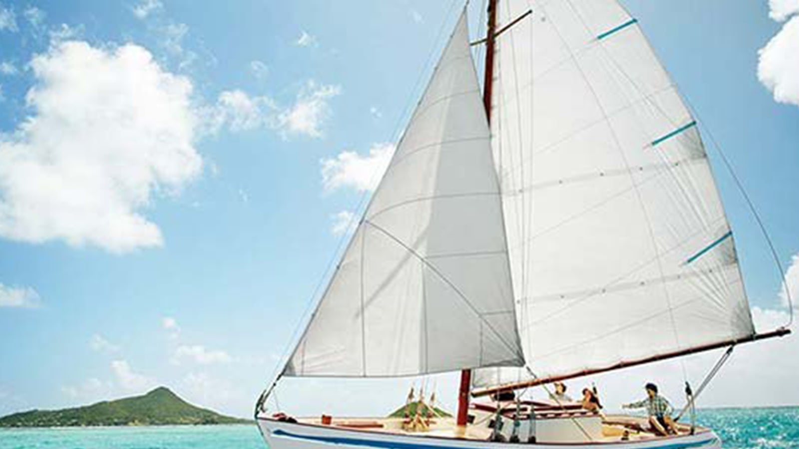 articles/2013/09/05/my-island-vacation-exploring-the-blissfully-quirky-grenadines/130905-moon-grenadines-charter-sailboat_oxzmzd