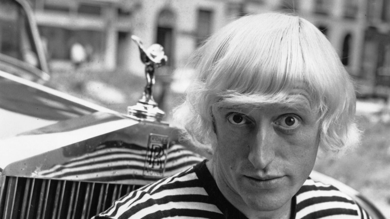 articles/2012/10/23/bbc-director-general-faces-parliament-in-jimmy-saville-affair-can-the-bbc-restore-its-reputation/jukes-jimmy-savile-bbc-tease_sgxwyx