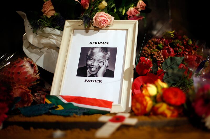 galleries/2013/12/06/goodbye-madiba-the-world-mourns-nelson-mandela-photos/131205-mandela-reax-1_kvcgle