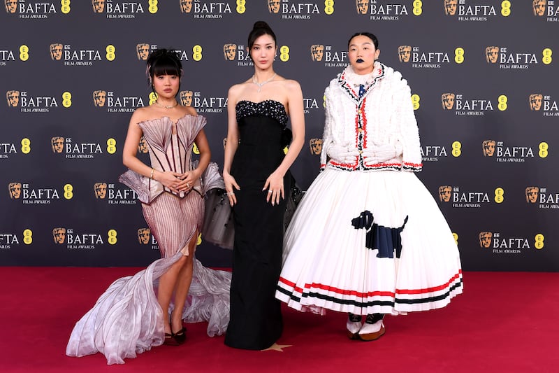 Rei Ami, EJAE and Audrey Nuna (L-R) attend the EE BAFTA Film Awards 2026 at The Royal Festival Hall on February 22, 2026 in London, England.