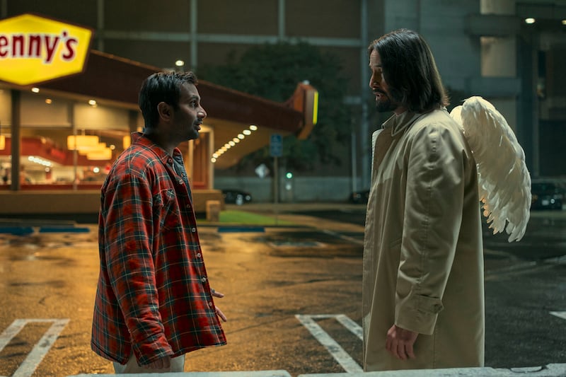 Aziz Ansari as Arj and Keanu Reeves as Gabriel in "Good Fortune."