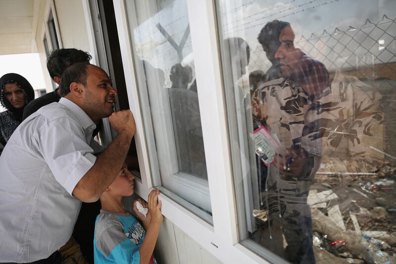 galleries/2014/06/16/thousands-flee-violence-in-iraq-photos/140616-iraq-refugees-4_fvpklb