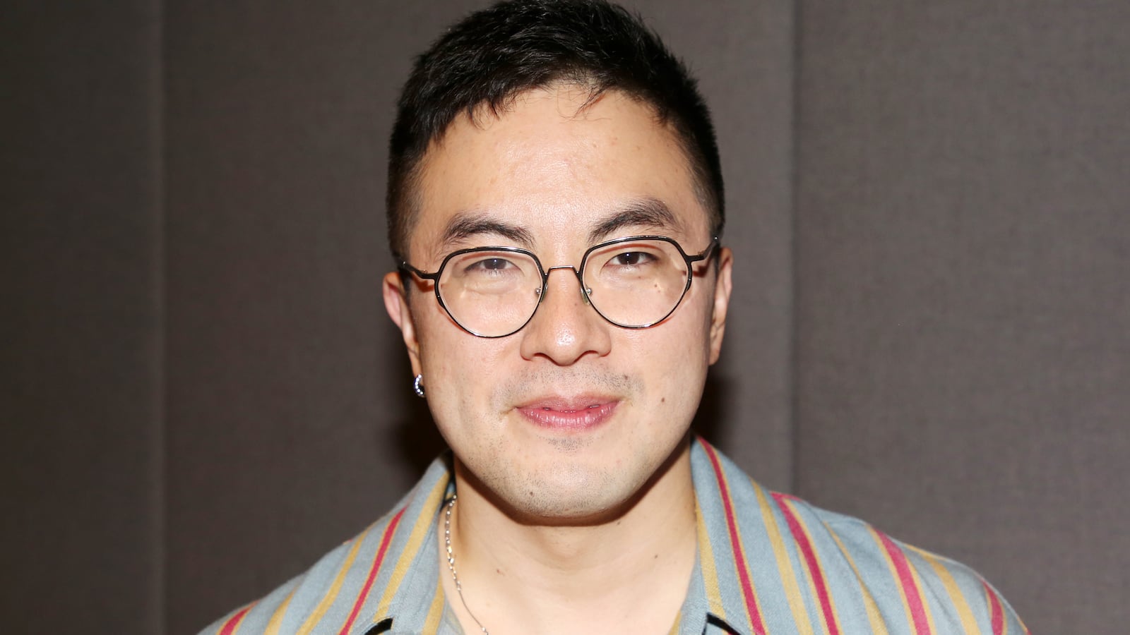 Bowen Yang pose at the opening night of "Julio Torres Color Theories" at The Performance Space New York on September 10, 2025 in New York City.