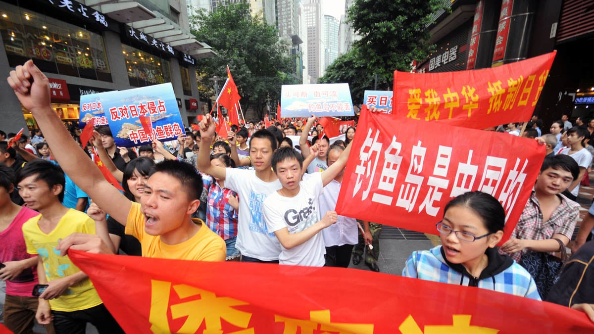 cheats/2012/09/18/japanese-businesses-in-china-close/china-anti-japan-demonstrations-liu_j8pjz0