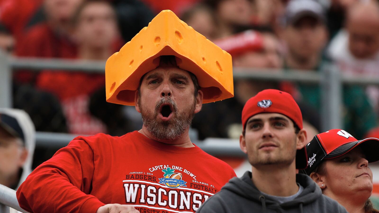 articles/2014/10/31/how-the-university-of-wisconsin-badgers-are-bucking-the-big-ten-ticket-flop/141030-weidy-badgers-tease_jfng48