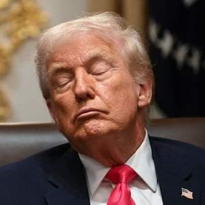 US President Donald Trump attends a Cabinet Meeting in the Cabinet Room of the White House in Washington, DC on December 2, 2025.