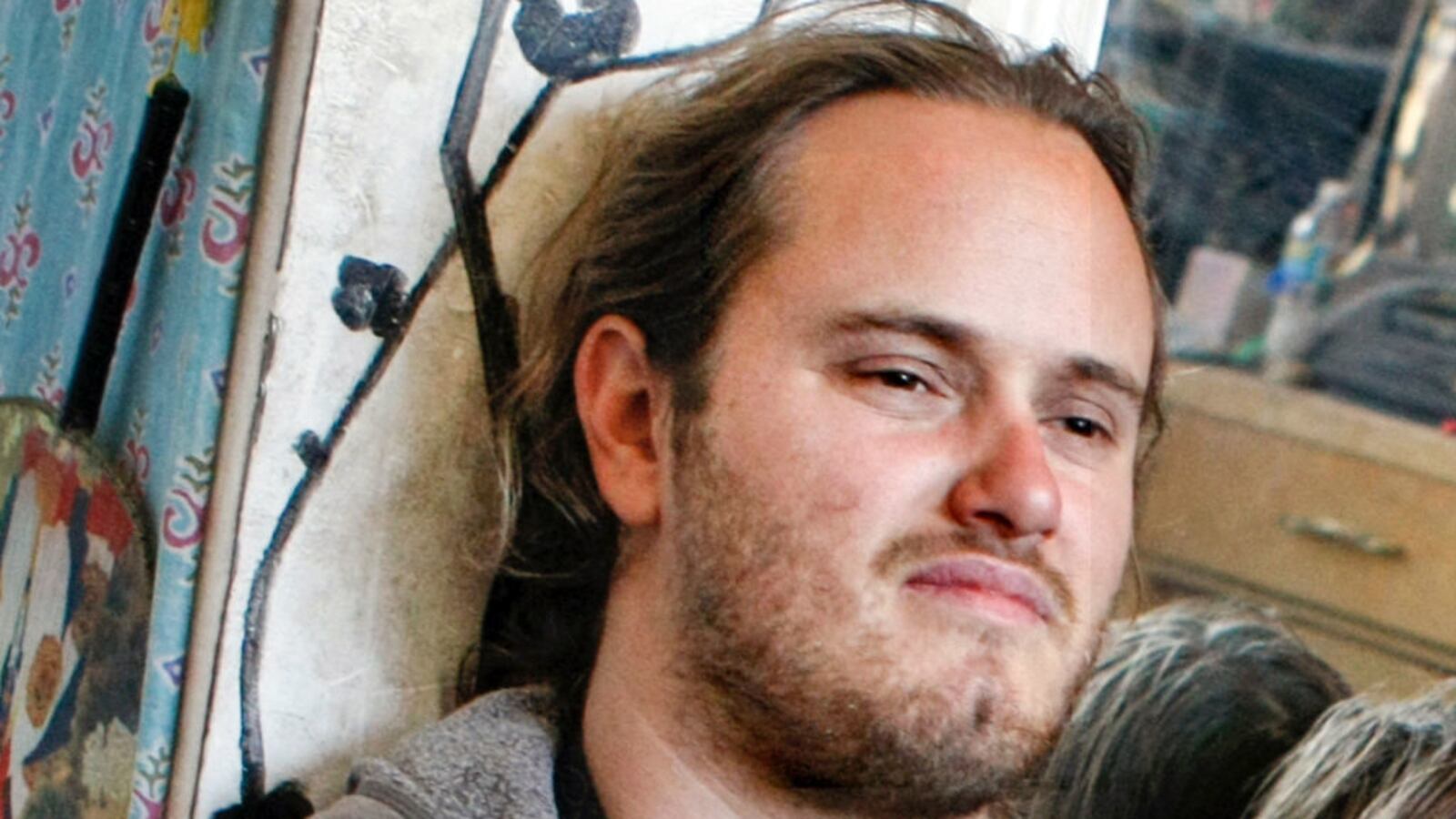 David DePape stares forward while sitting.