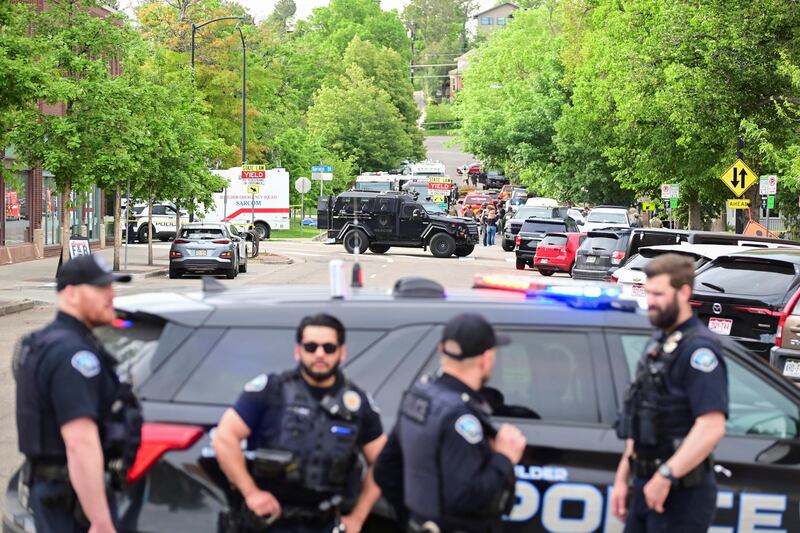 Police gather, after an attack that injured multiple people, in Boulder, Colorado