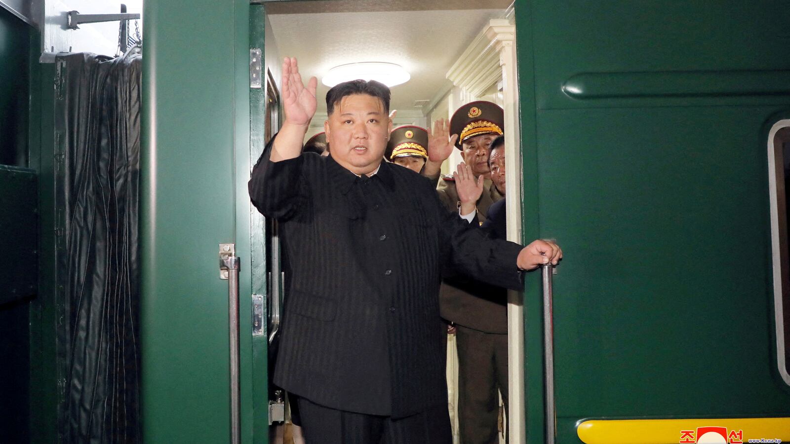 North Korean leader Kim Jong Un waves from a private train as he departs Pyongyang, North Korea, to visit Russia, September 10, 2023