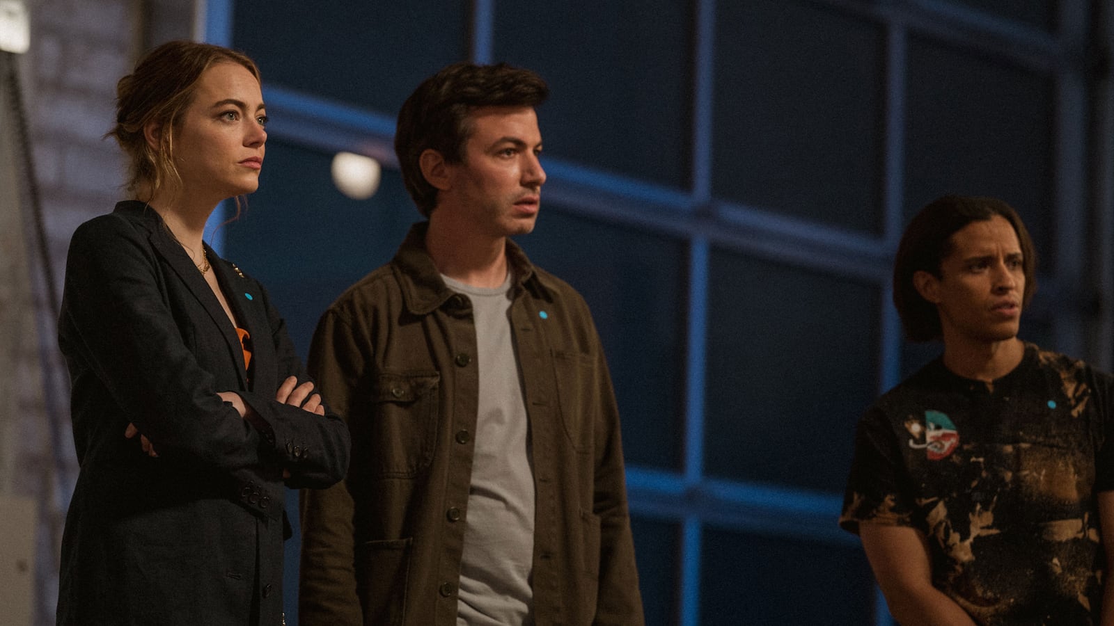 Emma Stone and Nathan Fielder stand next to each other in a still from ‘The Curse’