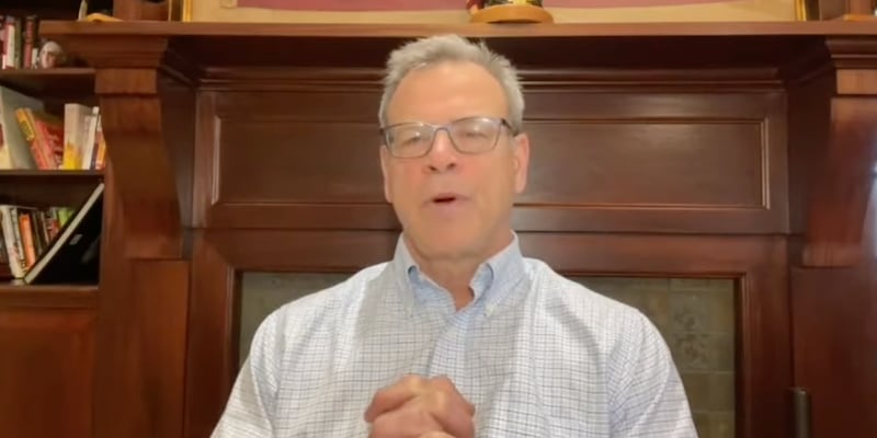 Kurt Olsen is being interviewed.