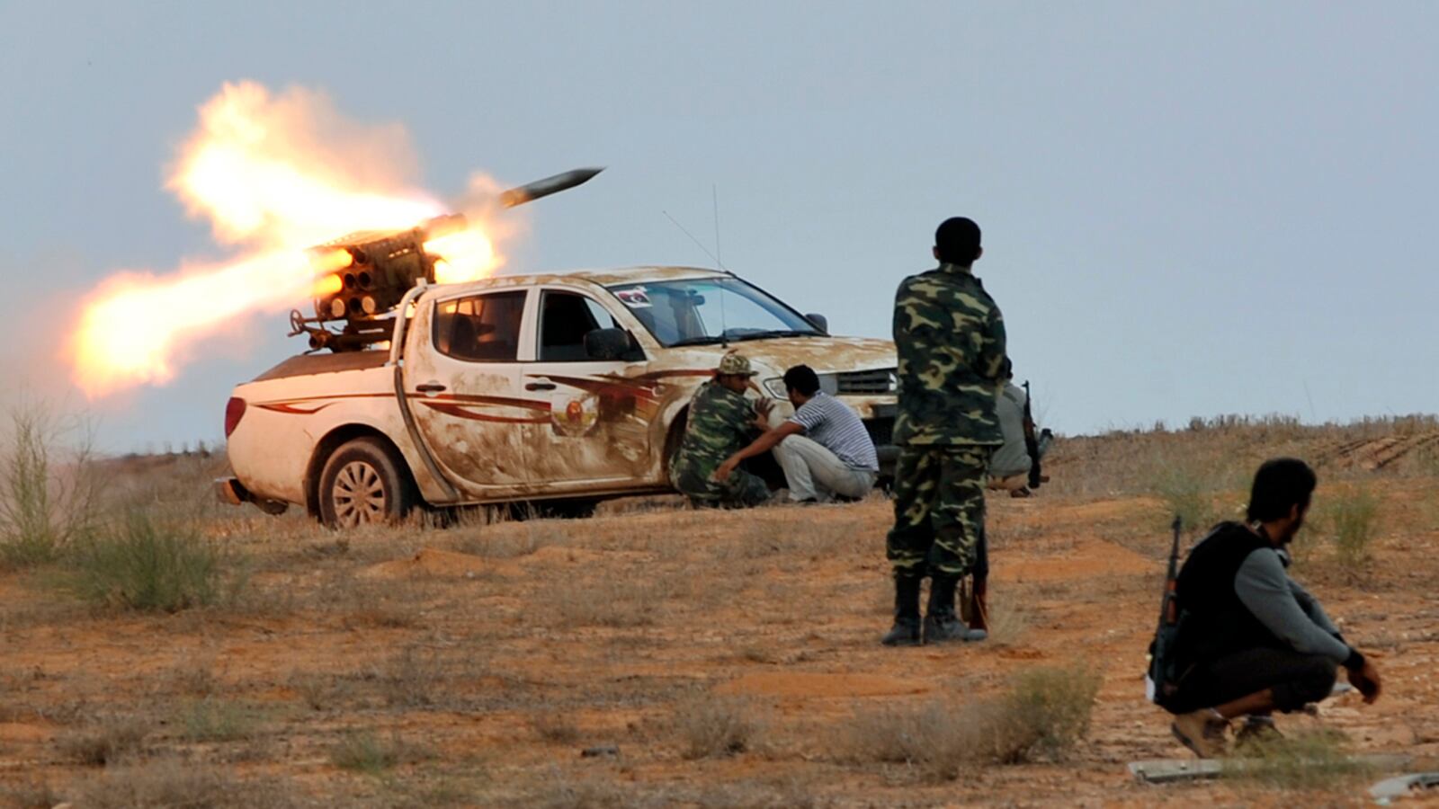 cheats/2011/10/14/fight-between-libyan-factions-ends/libya-nato-cheat_iul7bn