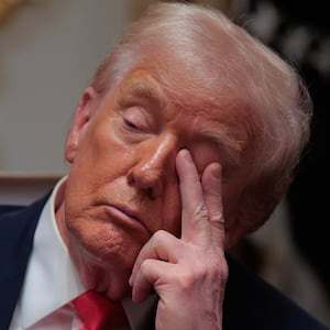 President Donald Trump attends a meeting of his Cabinet in the Cabinet Room of the White House on December 02, 2025 in Washington, DC.