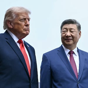 China's President Xi Jinping and President Donald Trump visit the Temple of Heaven in Beijing on May 14, 2026.