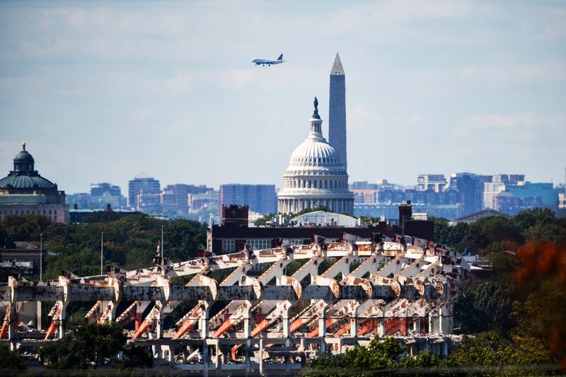 UNITED STATES - OCTOBER 6: The partially demolished Robert F. Kennedy Memorial Stadium is seen with the U.S. Capitol and Washington Monument on Monday, October 6, 2025. The new Commanders stadium will be built on the site and is expected to open in 2030. (Tom Williams/CQ-Roll Call, Inc via Getty Images)