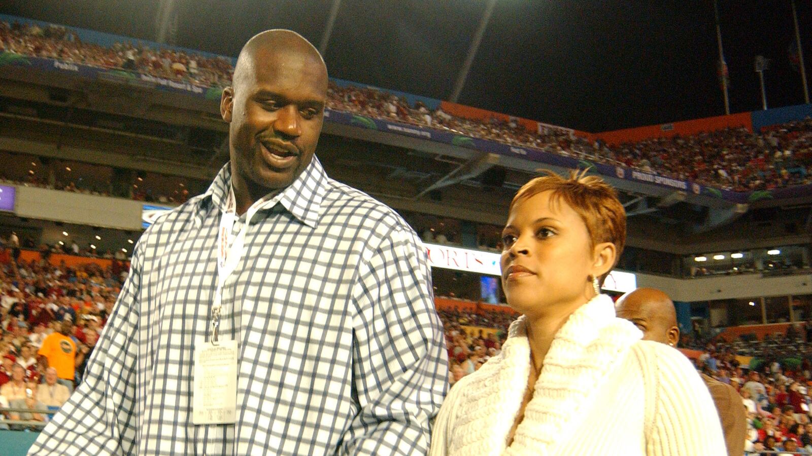 Shaquille O'Neal and wife Shaunie attend the FedEx Orange Bowl National Championship at Pro Player Stadium in Miami, Florida on January 4, 2005.