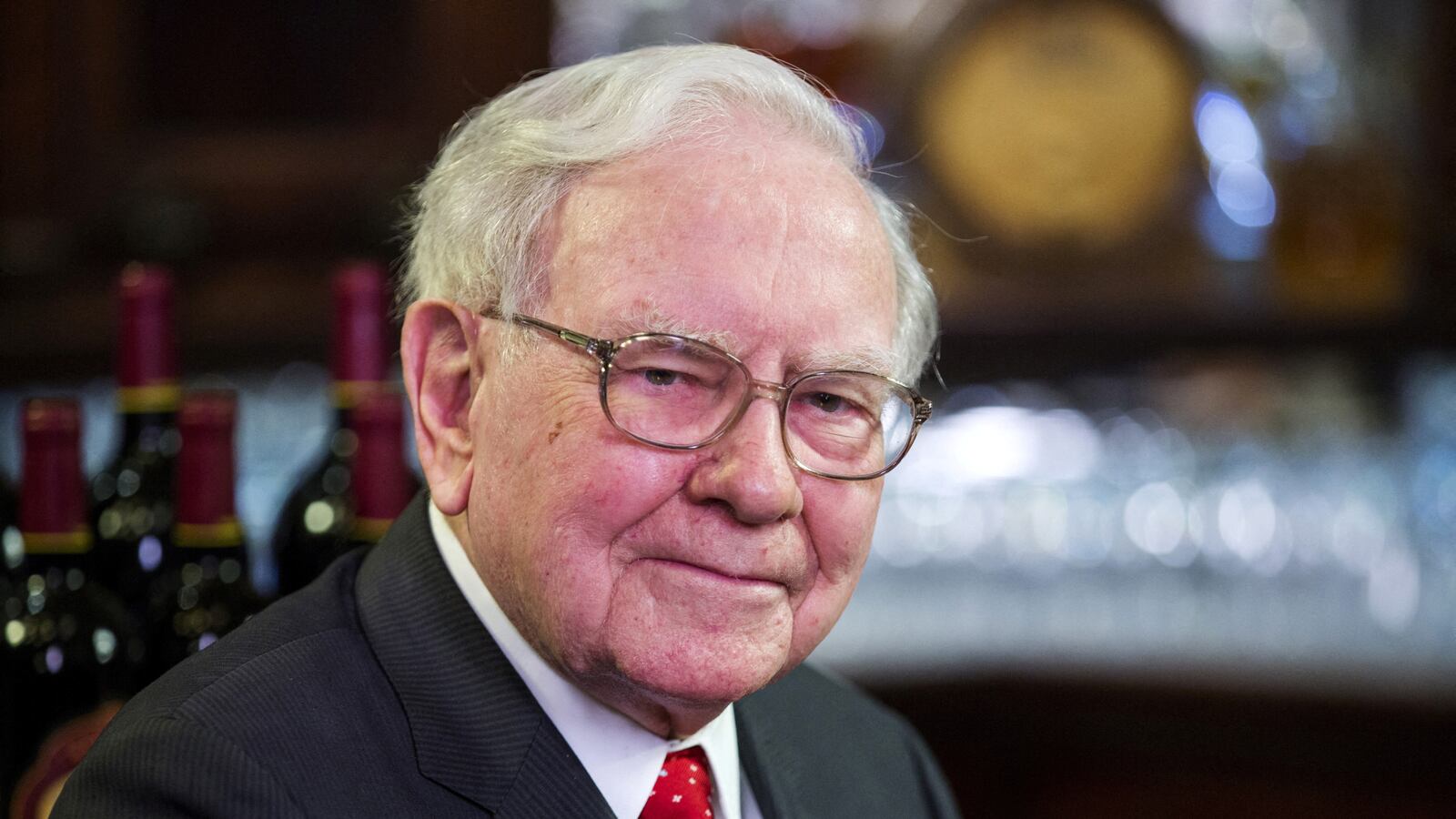Warren Buffett takes part in interviews before a fundraising luncheon.