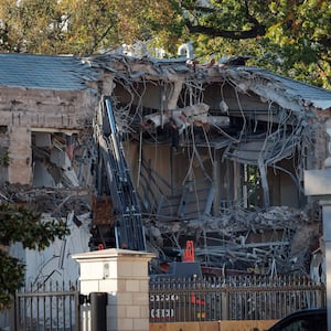 The facade of the East Wing of the White House is demolished by work crews on October 20, 2025 in Washington, D.C..