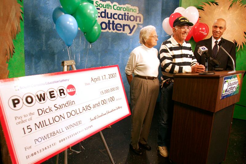 articles/2012/11/27/powerball-winners-on-being-filthy-rich/powerball-winners-dickson-tease_pwgj4k