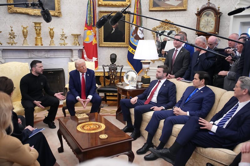 President Donald Trump (C) and Vice President JD Vance meet with Ukrainian President Volodymyr Zelensky in the Oval Office at the White House on February 28, 2025 in Washington, DC. Trump and Zelensky are meeting today to negotiate a preliminary agreement on sharing Ukraine’s mineral resources that Trump says will allow America to recoup aid provided to Kyiv while supporting Ukraine’s economy. Secretary of State Marco Rubio and Treasury Secretary Scott Bessent were also in attendance.