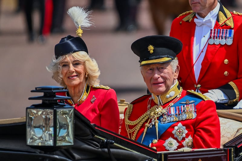 Britain's King Charles and Queen Camilla attend the Trooping the Colour parade to honour Britain's King Charles, as part of the official birthday celebrations, in London, Britain, June 13, 2026.
