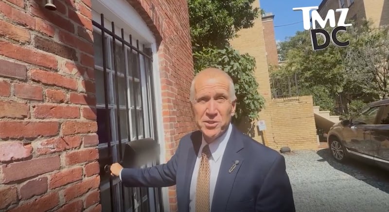 Thom Tillis outside a D.C. house.
