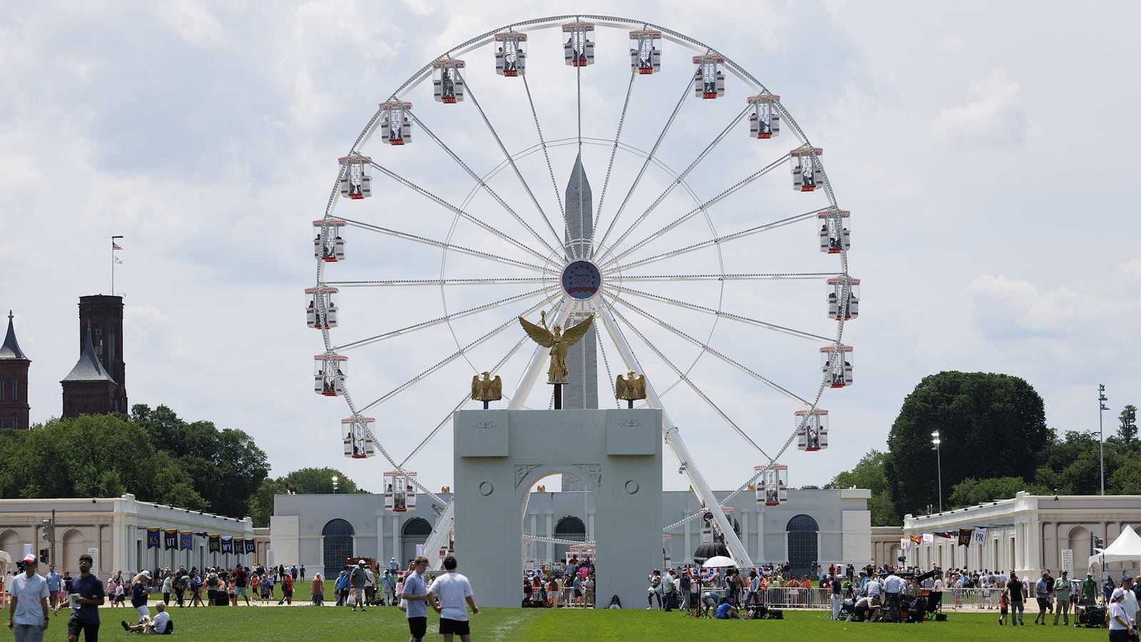 Visitors walk across the Great American State Fair on the National Mall in Washington, D.C., on June 25, 2026.