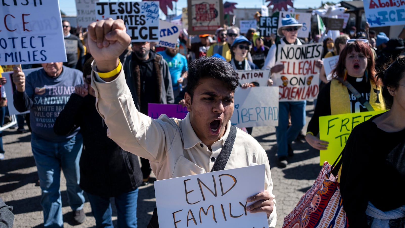 Protests against Immigration and Customs Enforcement as they march toward the South Texas Family Residential Center.