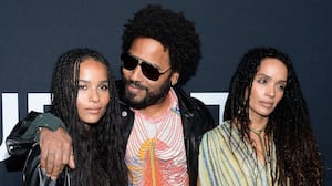 LOS ANGELES, CA - FEBRUARY 10: Musician Lenny Kravitz (center) and actresses Zoe Kravitz (L) and Lisa Bonet R) attend the Saint Laurent show at The Hollywood Palladium on February 10, 2016 in Los Angeles, California. (Photo by Kevork Djansezian/Getty Images)