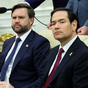 Vice President JD Vance and U.S. Secretary of State Marco Rubio look on during a meeting between U.S. President Donald Trump and Canadian Prime Minister Mark Carney in the Oval Office of the White House on October 07, 2025 in Washington, DC.
