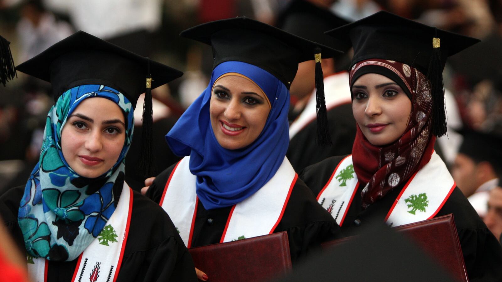 articles/2013/06/21/the-not-so-bright-future-of-palestine-s-class-of-2013/palestinian-women-graduation-openz_fsil6f