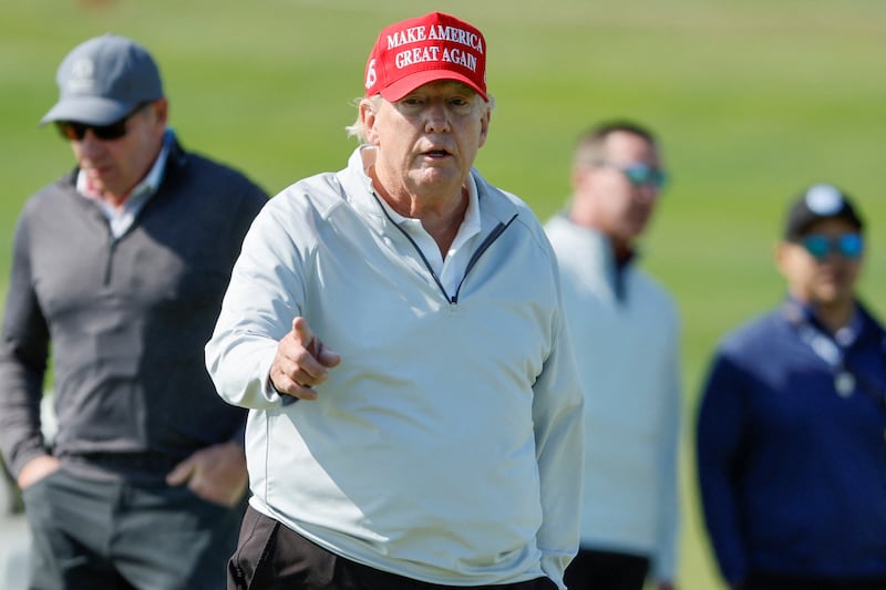 Donald Trump at one of his favorite places, a golf course.