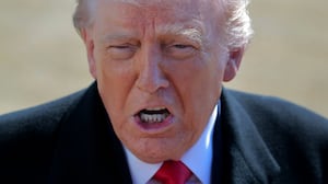 WASHINGTON, DC - FEBRUARY 13: U.S. President Donald Trump talks with reporters before he and first lady Melania Trump leave the White House on February 13, 2026 in Washington, DC. Trump is traveling to Fort Bragg in North Carolina to visit Special Operations troops who were involved in the capture of Venezuelan President Nicolas Maduro before continuing to his private Mar-a-Lago Club in Palm Beach, Florida, for the weekend. (Photo by Chip Somodevilla/Getty Images)