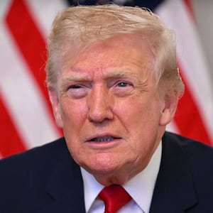 US President Donald Trump participates in a video call with military service members.