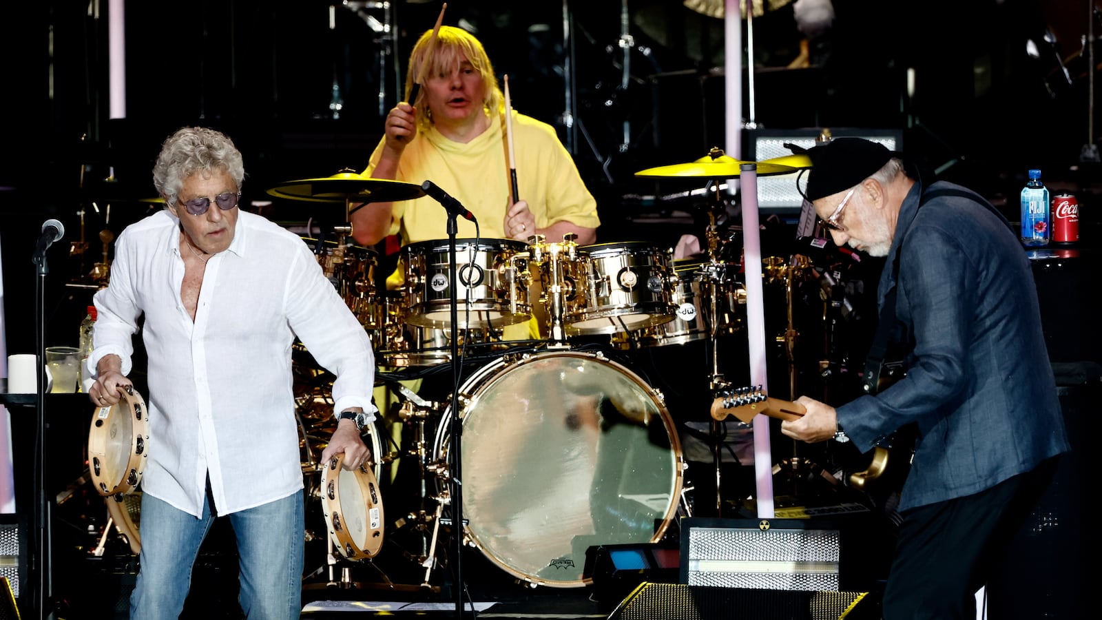 The Who's Roger Daltrey is seen on the left, drummer Zak Starkey in the center and guitarist Pete Townshend on the right during a concert in Berlin.