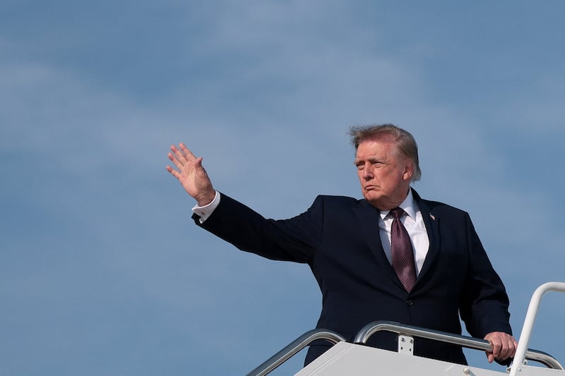 US President Donald Trump waves as he boards Air Force One for travel to Alabama at Joint Base Andrews, Maryland, US, October 2, 2026. REUTERS/Jessica Koscielniak