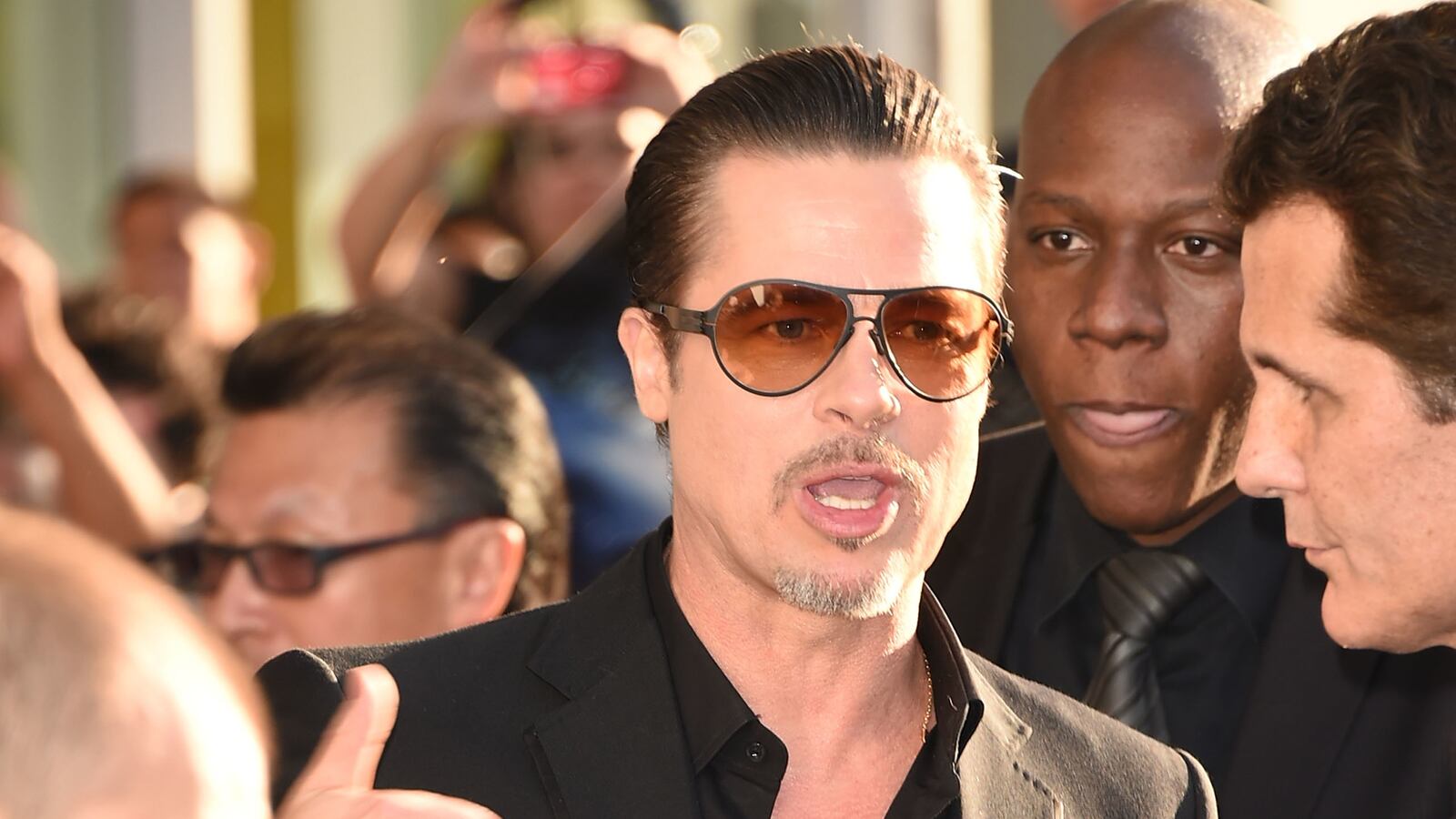 cheats/2014/05/29/brad-pitt-attacked-at-premiere/140529-brad-pitt-cheat_tv2pgz