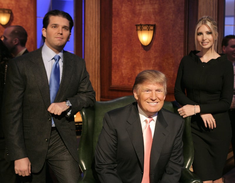 Donald Trump smiles with his eldest children, Donald Trump Jr. and Ivanka Trump, in 2007. It was around this time that the future president first began spreading vaccine-sceptic beliefs.