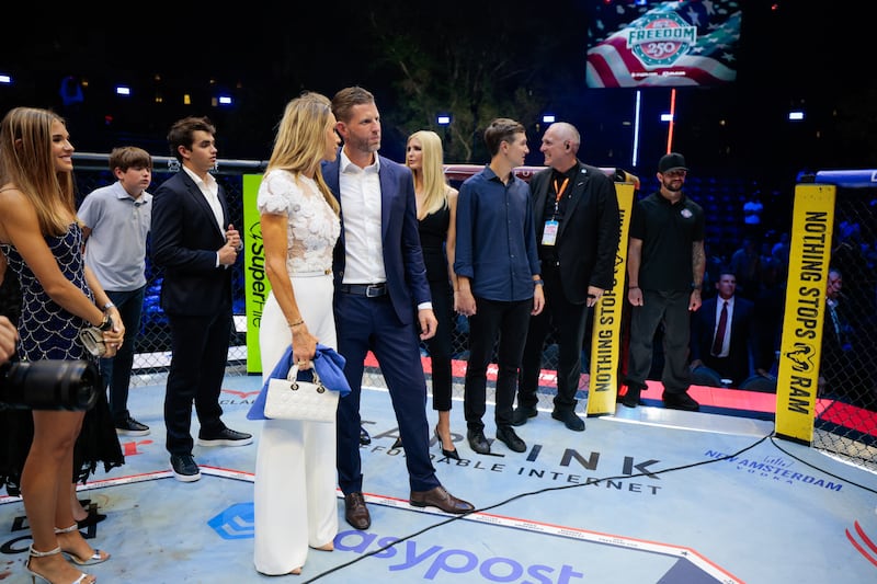 Eric Trump, Lara Trump and other guests gather inside the Octagon at UFC Freedom 250 on the South Lawn of the White House on June 15, 2026 in Washington, DC.