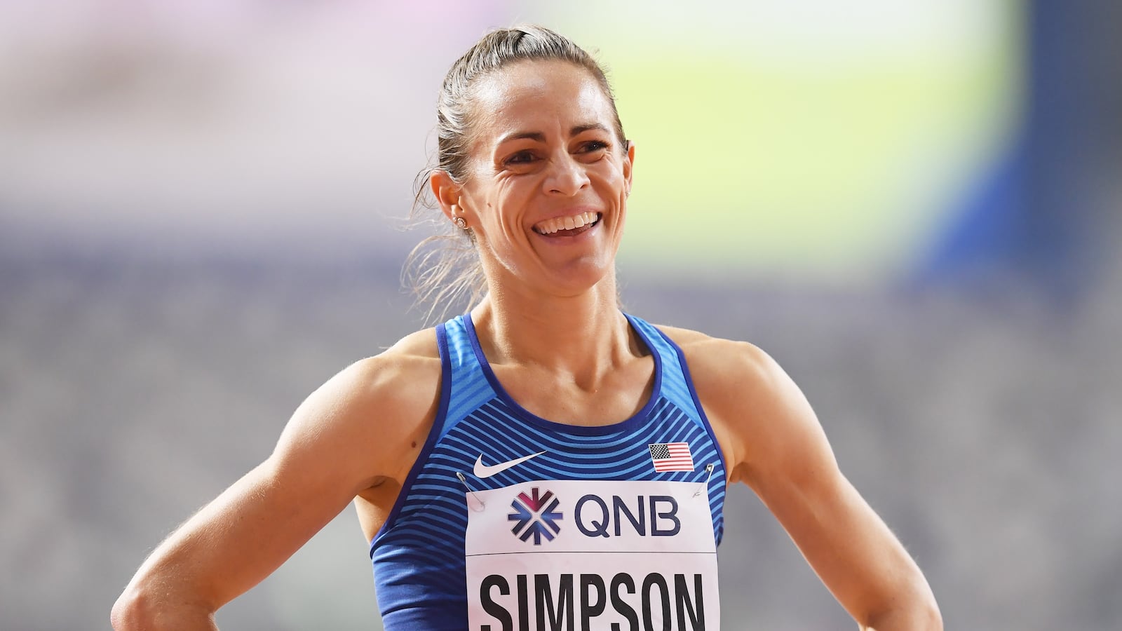 Jenny Simpson of the United States reacts after competing in the Women's 1500 metres heats during day six of 17th IAAF World Athletics Championships Doha 2019 at Khalifa International Stadium on October 02, 2019 in Doha, Qatar.