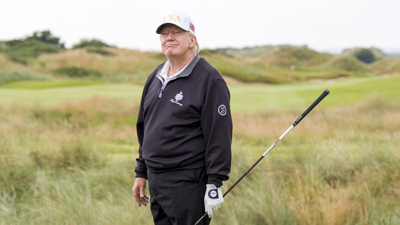 US President Donald Trump, on the first tee during the official opening of the New Course, the second championship course at Trump International Golf Links, on the Menie Estate in Balmedie, Aberdeenshire. The president is opening up a new course dedicated to his Scottish mother, who grew up on the Isle of Lewis, as part of his five-day private trip to the country. Picture date: Tuesday July 29, 2025. (Photo by Jane Barlow/PA Images via Getty Images)
