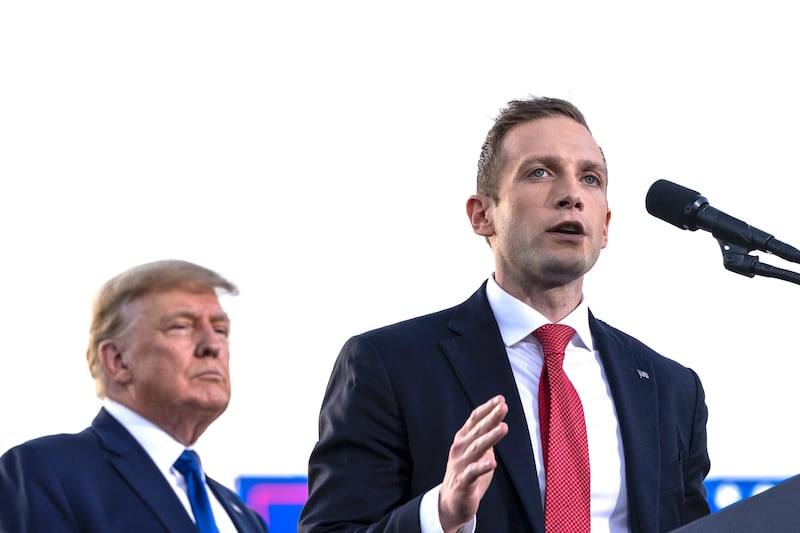 DELAWARE, OH - APRIL 23: (L-R) Former U.S. President Donald Trump listens as Max Miller, Republican candidate for Ohio's 7th congressional district, speaks during a rally hosted by the former president at the Delaware County Fairgrounds on April 23, 2022 in Delaware, Ohio. Last week, Trump announced his endorsement of J.D. Vance in the Ohio Republican Senate primary.