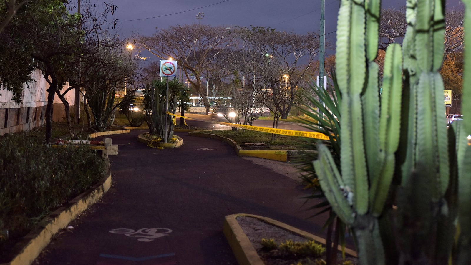 A police barricade tape is seen at a cordoned-off area where Ecuadorean prosecutor Cesar Suarez, who focused on cases involving organized trans-national crime in Guayas province, was killed, in Guayaquil, Ecuador, January 17, 2024.